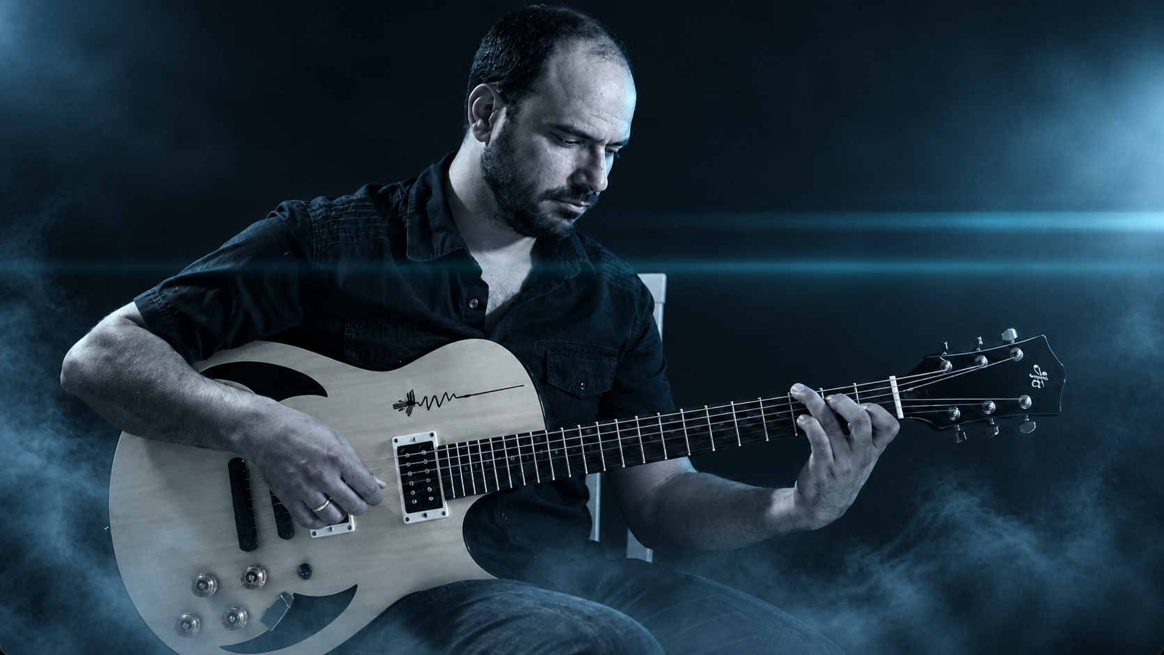 José Allende with his guitar